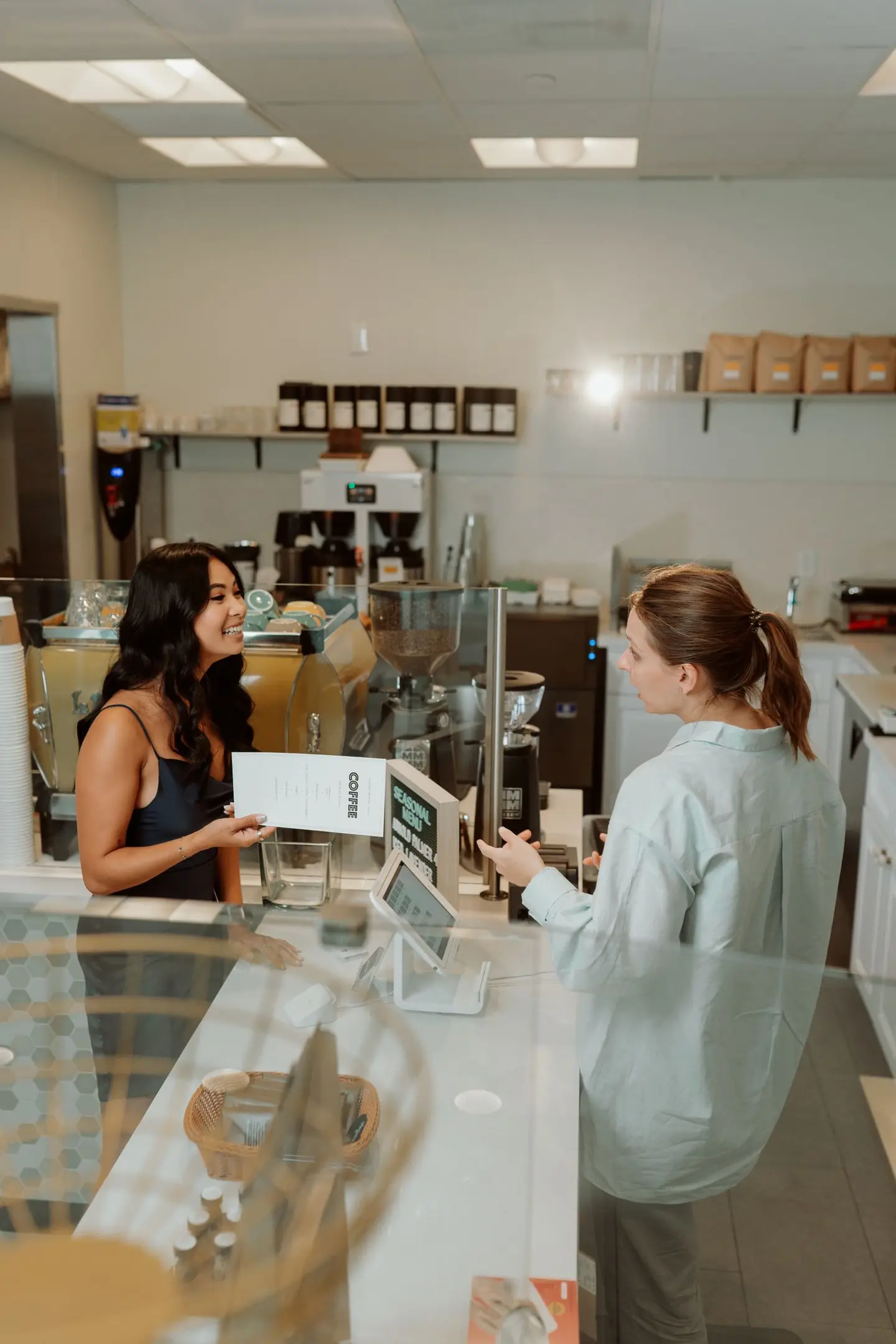 Barista Taking Orders from a Customer