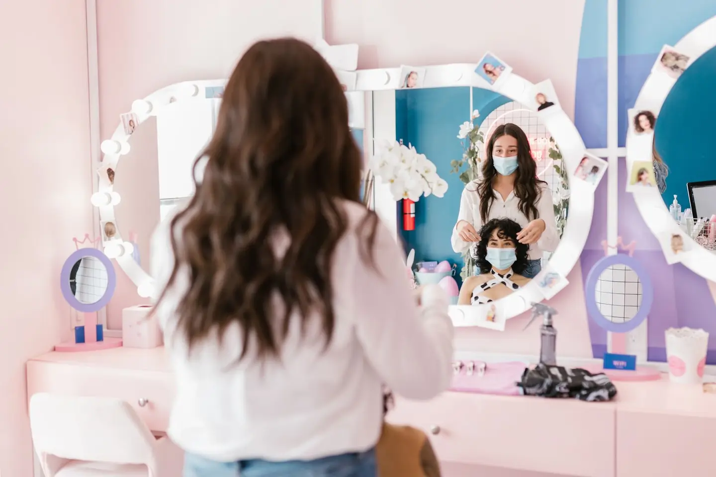 A Hairdresser Working on a Client