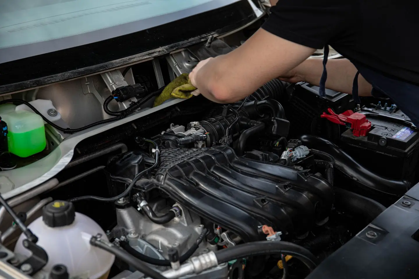 Mechanic Fixing a Car
