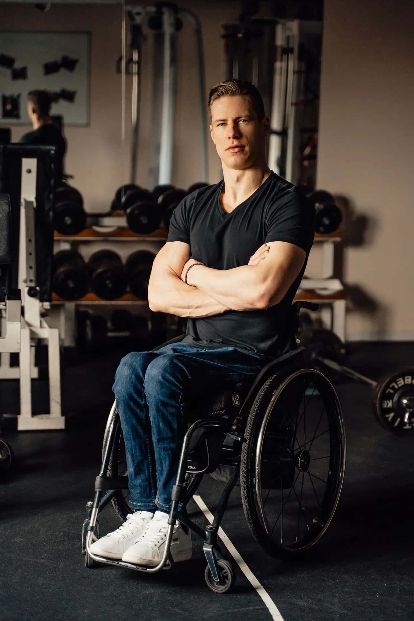 A Man in a Wheelchair while in a Training Facility