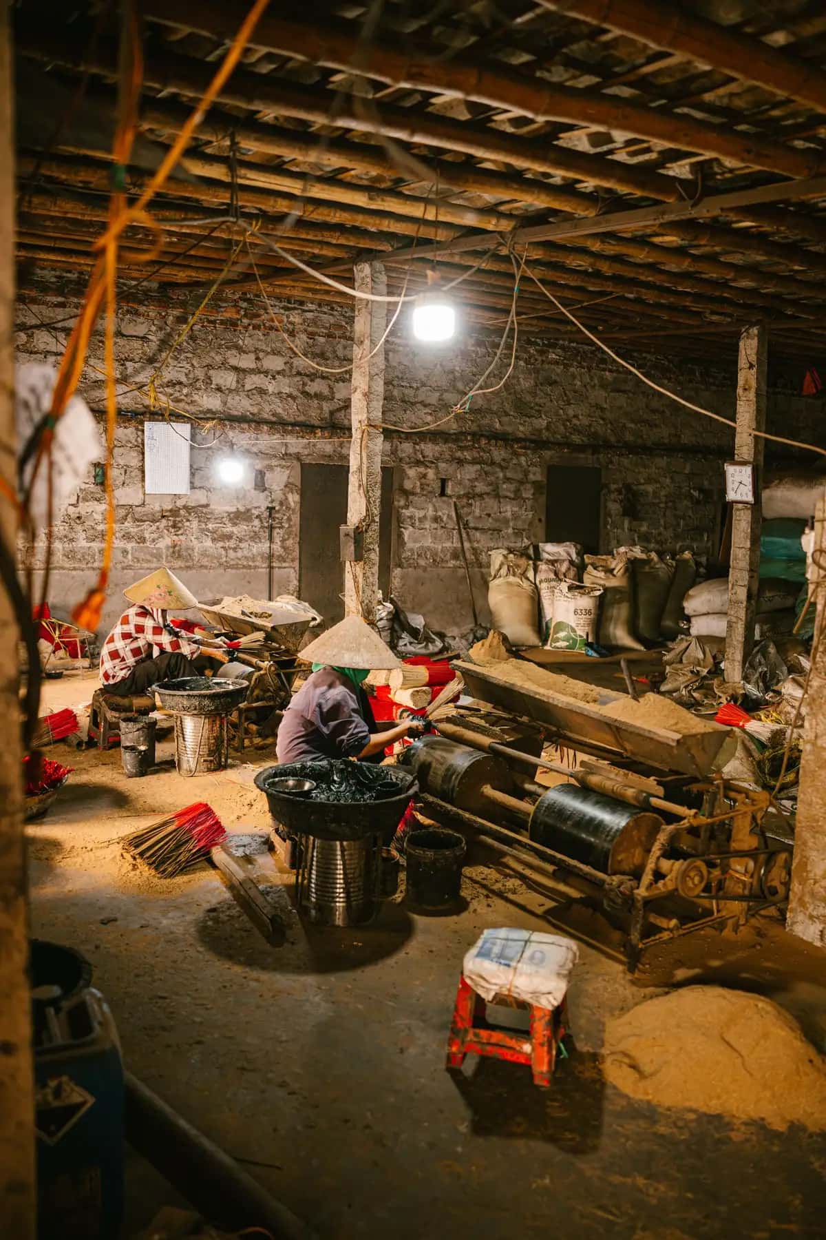 Laborers Working in Rustic Industrial Warehouse